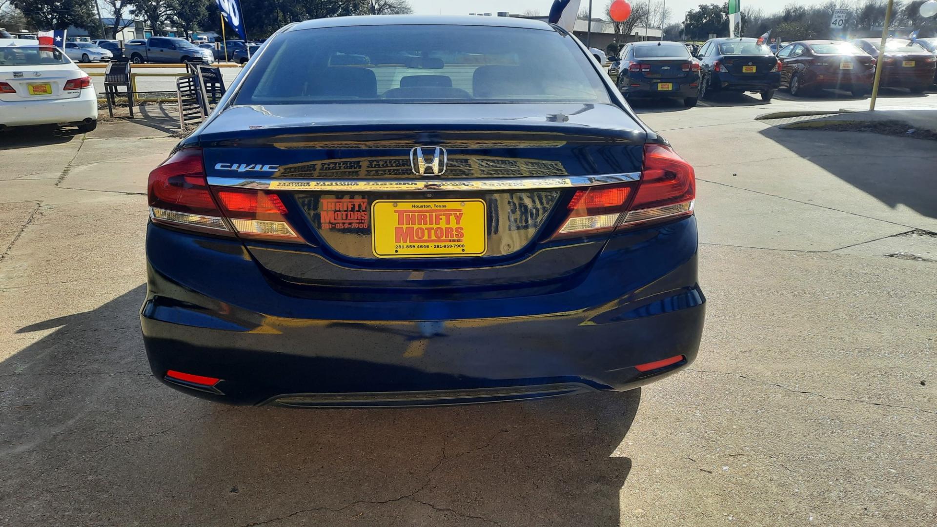 2014 Honda Civic LX Sedan CVT (19XFB2F58EE) with an 1.8L L4 SOHC 16V engine, Continuously Variable Transmission transmission, located at 16710 Clay Rd., Houston, TX, 77084, (281) 859-7900, 29.834864, -95.656166 - Photo#2